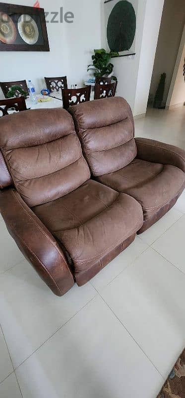 recliner two seater sofa. Good condition. 4