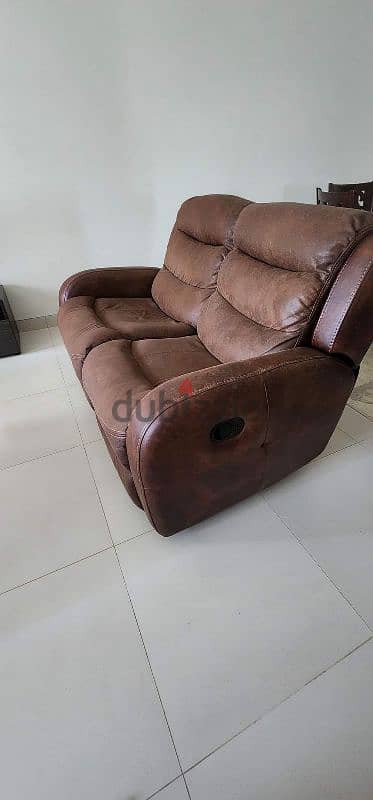 recliner two seater sofa. Good condition. 5