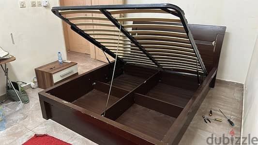 King sized bed with compartment