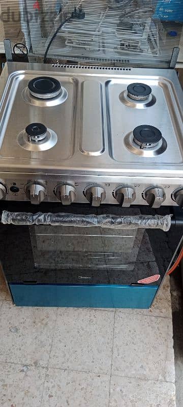 midea gas cooker for sale same like new