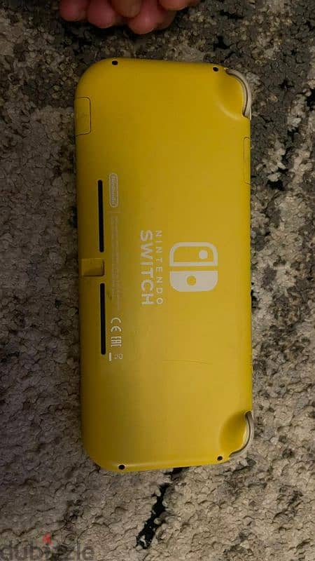 Nintendo switch lite like new yellow with original charger 1