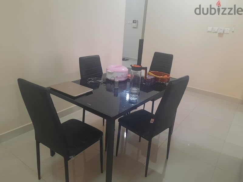 1 month used 7 seater sofa, dining table with 4 chairs 1