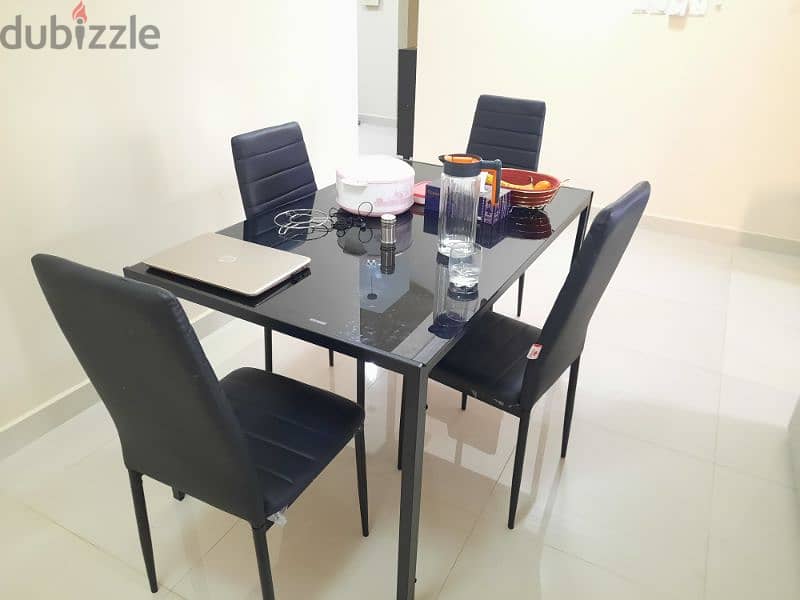 1 month used 7 seater sofa, dining table with 4 chairs 4