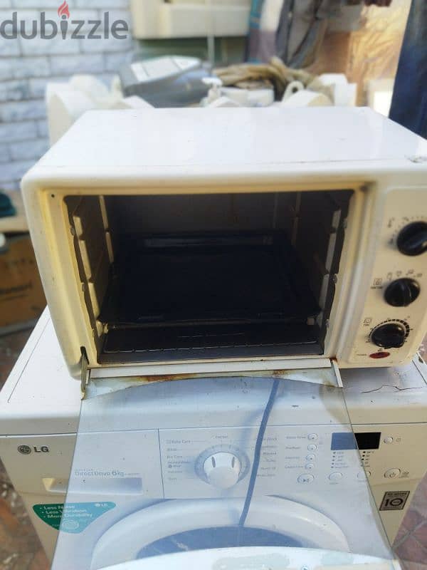 front door washing machine dispenser microwave oven good condition 5