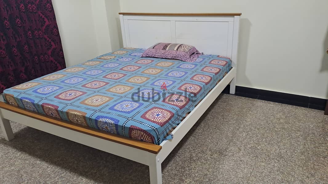 King size wooden bed and spring mattress 1 yr old and 3 month only us 0