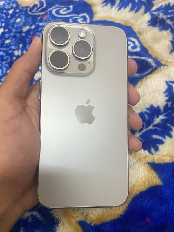 iPhone 15 pro natural titanium 0