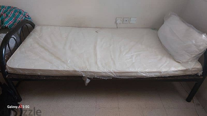 bed with wooden plank 0