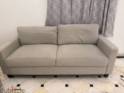 Three seater light grey sofa,Used for only three months