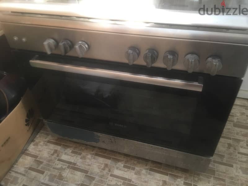 URGENT FOR SALE 5 BURNER COOKING RANGE STOVE WTH GRILL  GOOD CONDITION 2