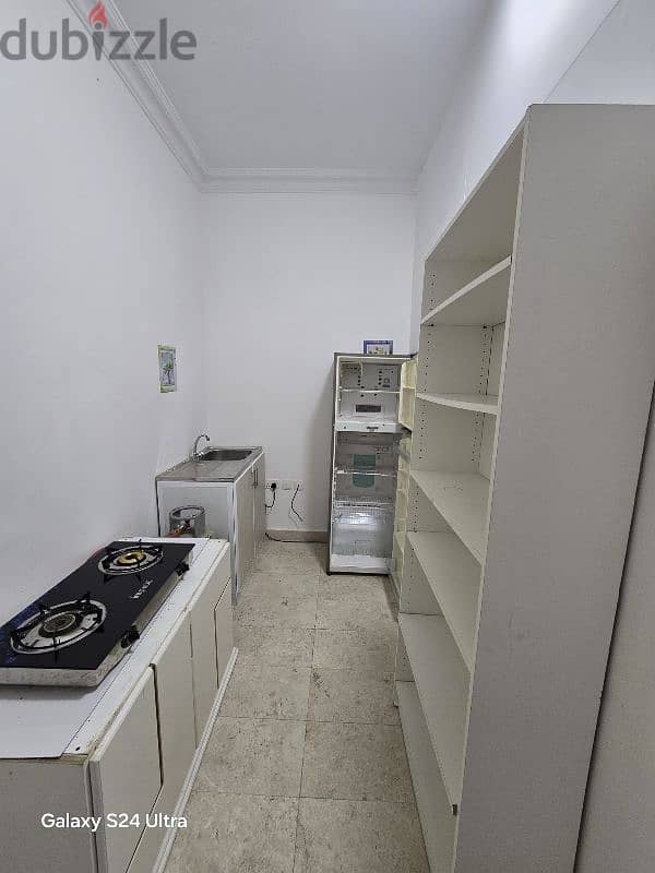 room with bathroom and kitchen ner Ameri Market alkood 7 2