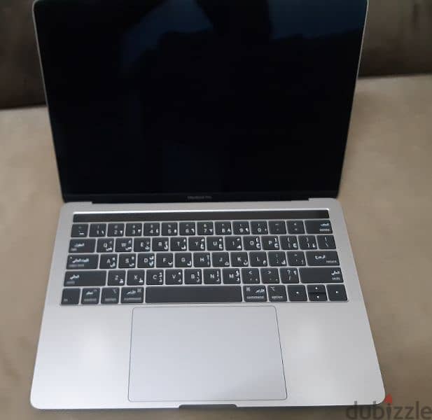 macbook pro with touchbar 512gb SSD, 16 GB ram, i5, 2.3ghz 4