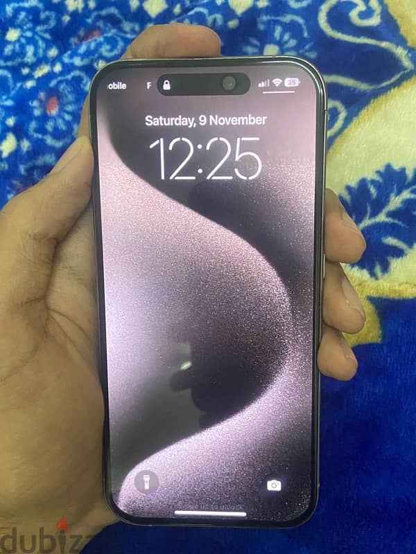 iPhone 15 pro natural titanium 2