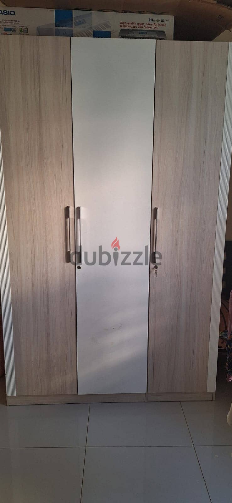 Three Door Wooden Wardrobe and Two door Steel wardrobe 0