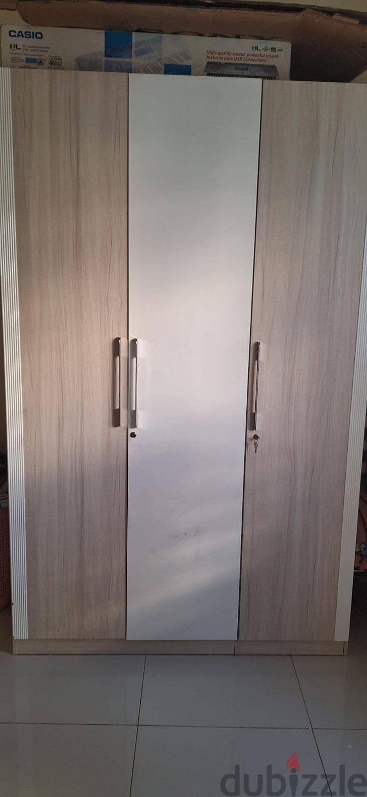 Three Door Wooden Wardrobe and Two door Steel wardrobe 1