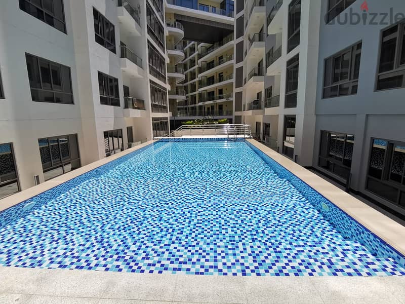 2 BR Elegant Apartment Muscat Hills with Pool & Gym 9