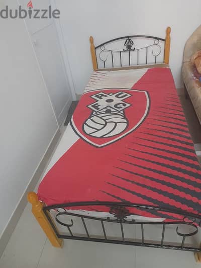 single steel cot and mattress