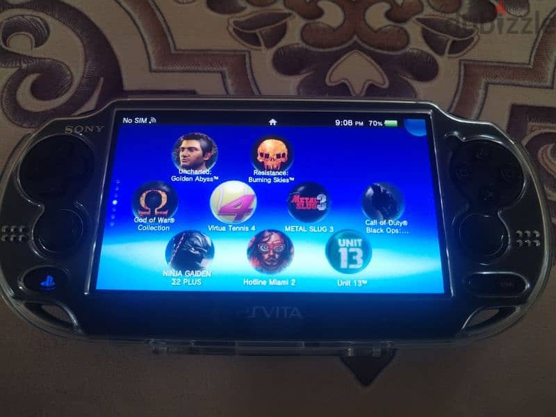 ps vita haked with 2 memory card 4 and 64 gig 6