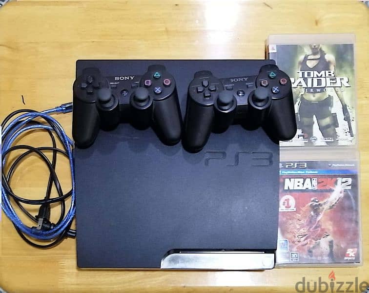 Sony PlayStation 3 silm, 150GB of storage with two PS3 games. . . 0