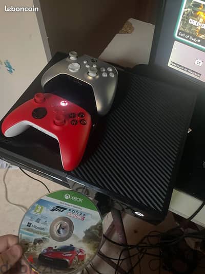 Neat and clean Xbox one storage One terabyte 2 controllers and