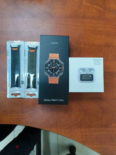 Galaxy watch ultra with 2 straps and earpods