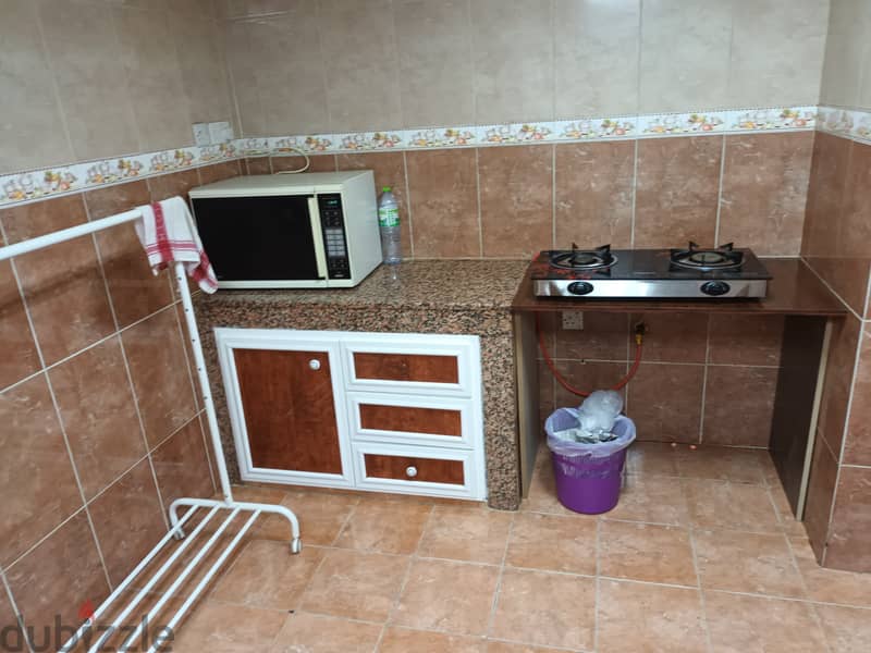 Sharing Furnished Room With Attached Bathroom For Bachelors in Ruwi 1