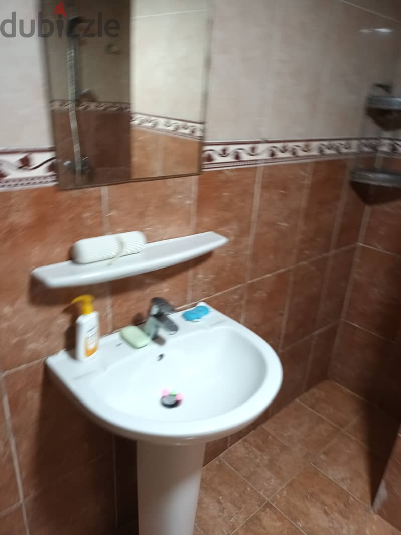 Sharing Furnished Room With Attached Bathroom For Bachelors in Ruwi 5