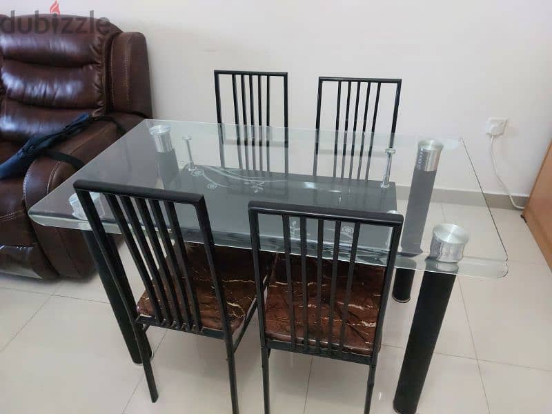 Add magic to every meal with this beautiful glass dining table. 1