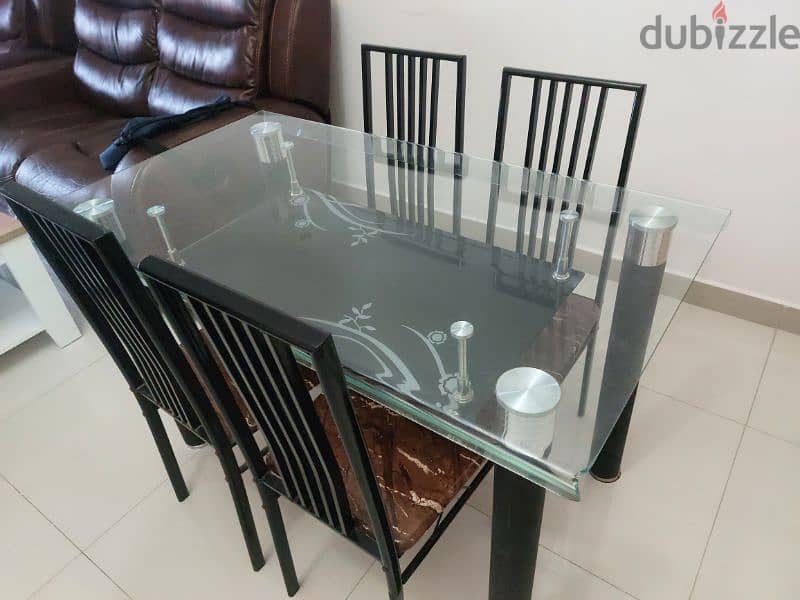 Add magic to every meal with this beautiful glass dining table. 2