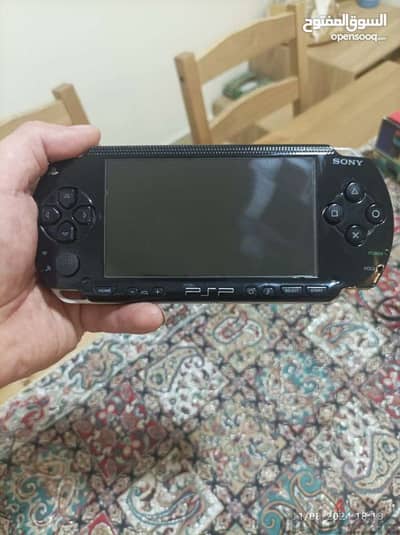 PSP loaded with games interested message me Whatsapp 79784802