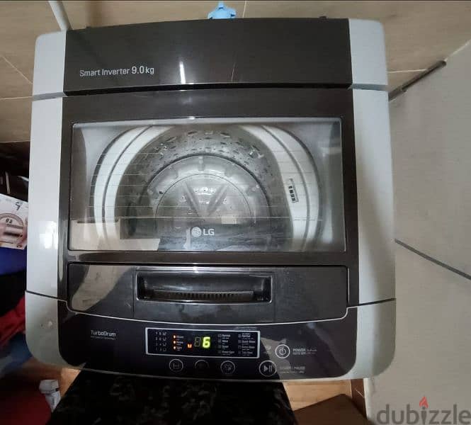 LG 9KG TOPLOADING WASHIGN MACHINE 1