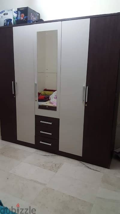 5 door wooden cupboard