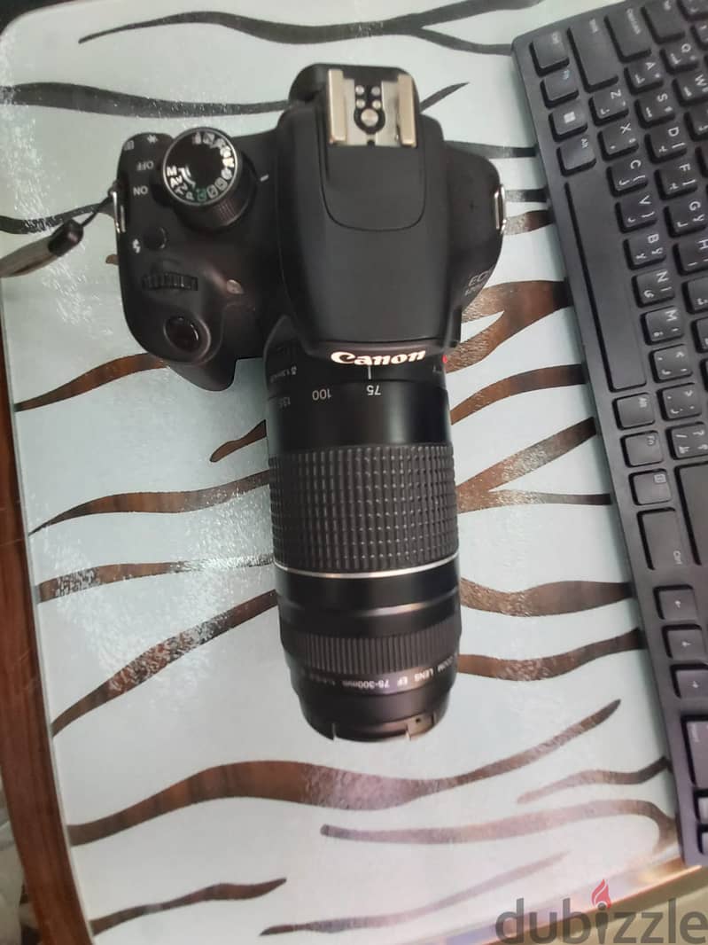 Very clean Canon EOS 1200 D with Powerful longrange Lens 2