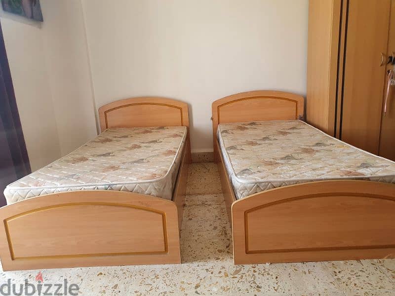 twin bed with matress both for 30 rials 0