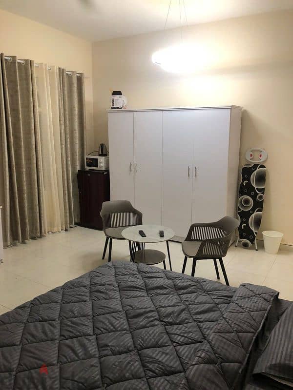 Fully furnished studio room for rent al ghubra sharing kitchen 3