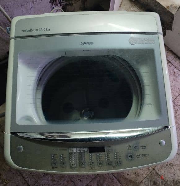 LG TOP LOAD WASHING FOR SALE IN THE VERY GOOD CONDITION 0