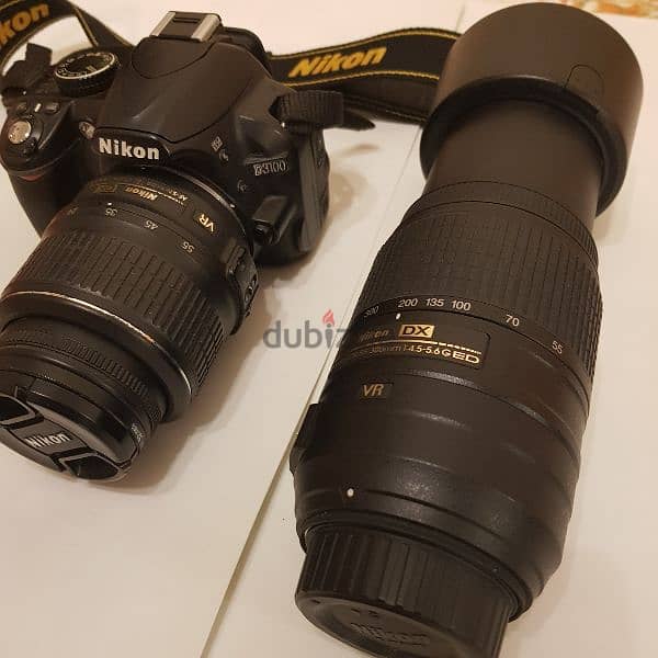 NIKON D3100 with DX VR Lense 55 -300 1