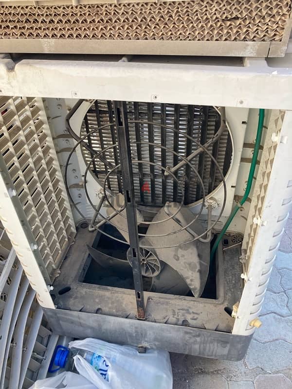 cooler scrap material has fan and small steal inside with wheals 15ria 2