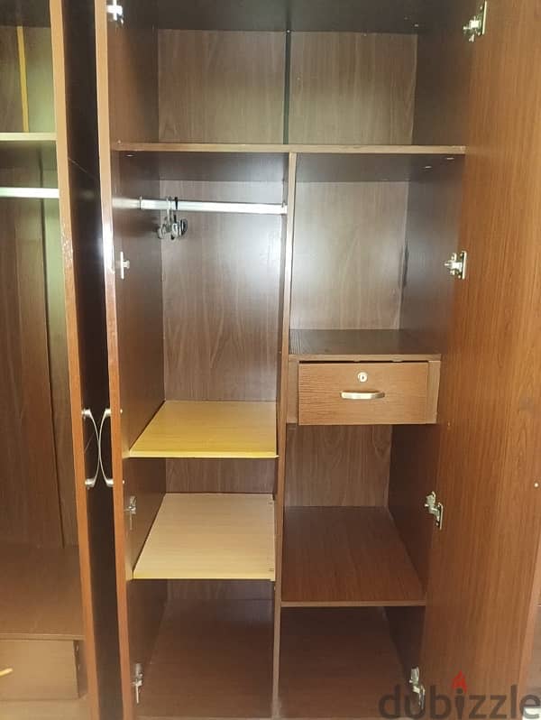 king size bed, 2 side drawer with matteres and 4 door cupboard 3