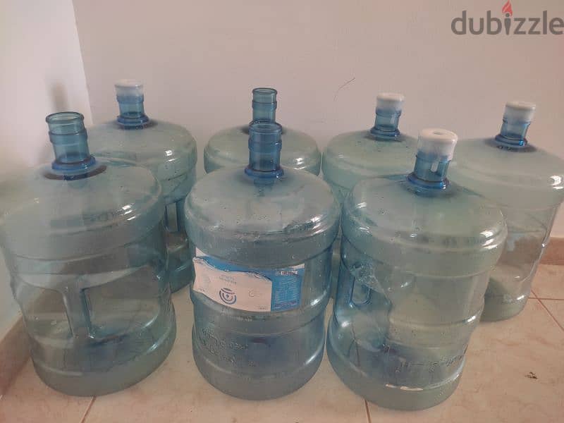 7 number R YA water bottle sale in Al khoudh only RO. 5 1