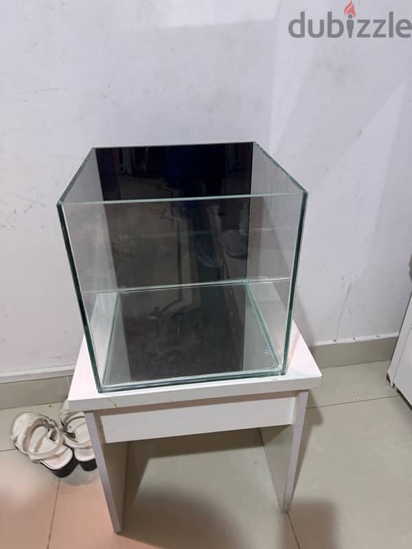 nmNever used 30 cm cube tank for sale at 12 rials 0