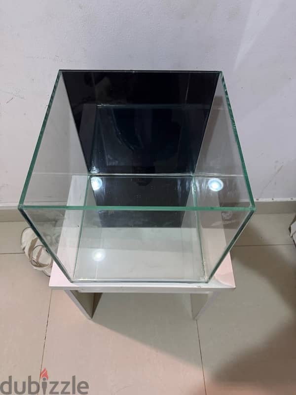 nmNever used 30 cm cube tank for sale at 12 rials 2