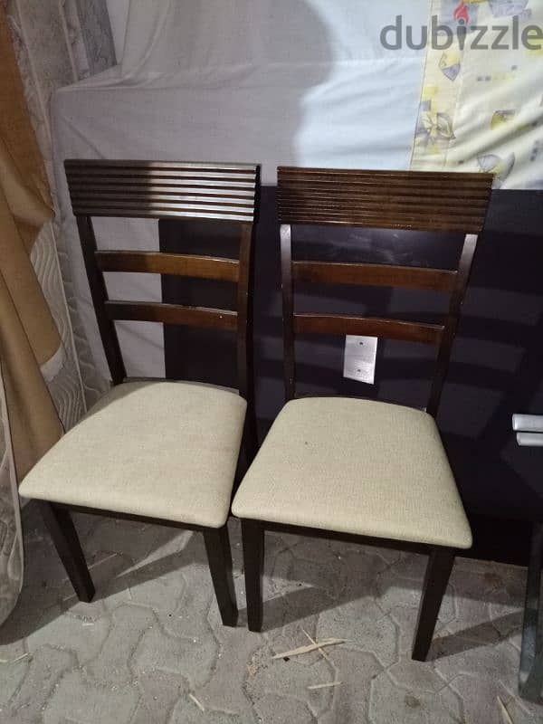 Glass Dining table with four chairs 4