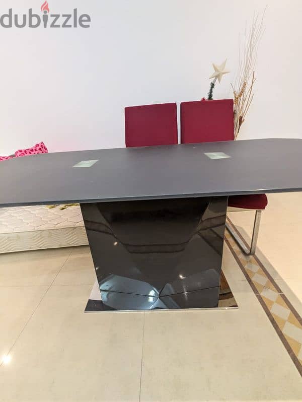 Glass Dining table with four chairs 6