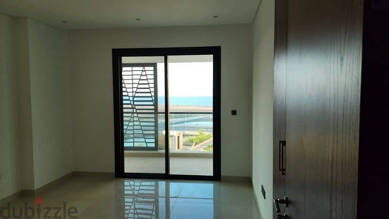 Sea view flat 2 bed rooms and hall for rent in almooj 7