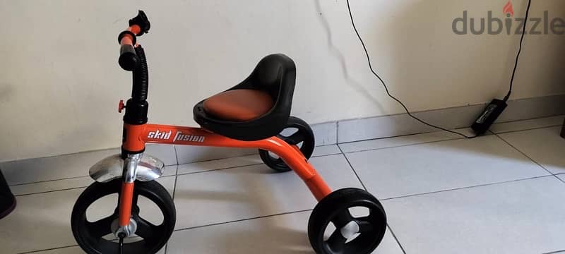 Excellent condition kids Race bike (rechargeable) & tricycle 2