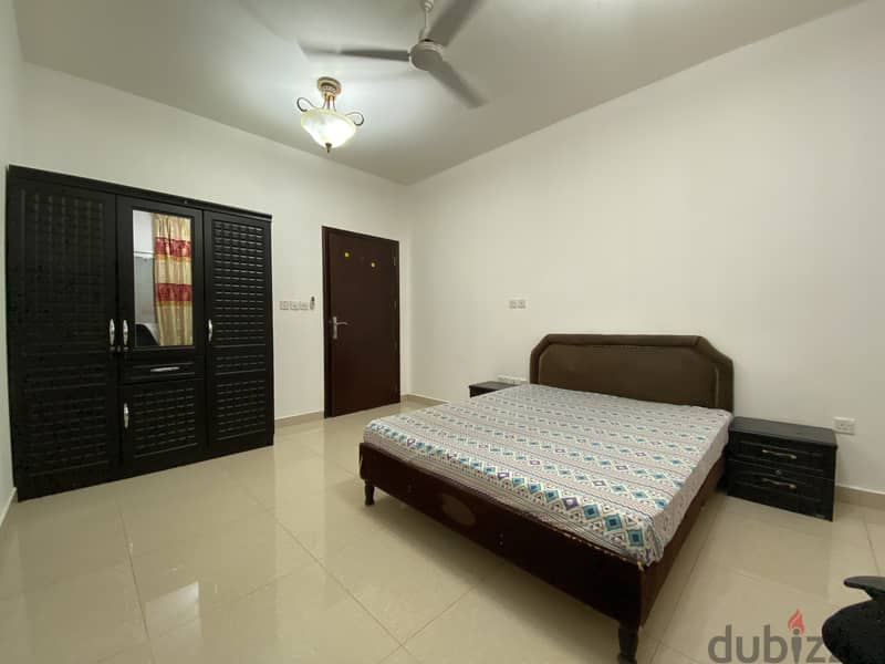 Fully furnished spacious room with private bathroom in Al Ghubra 0