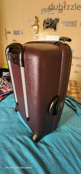 american tourister hard trolly medium size 7