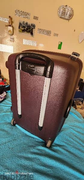 american tourister hard trolly medium size 8