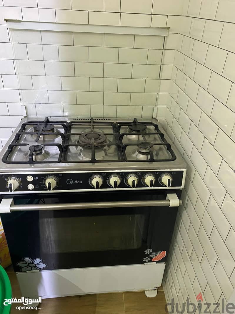 Gas cooker And Oven - Midea  موقد جاز - طباخه وفرن 0