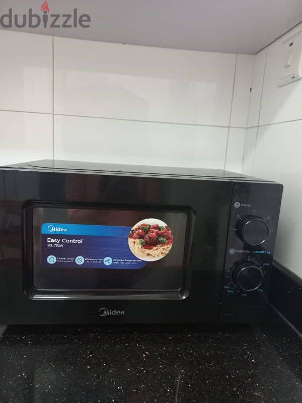 5 months used microwave oven 0